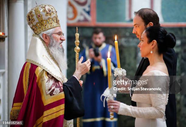 Serbian Orthodox Church Bishop Jovan of Sumadija performs the wedding ceremony of Prince Dushan and his bride Valerie De Muzio at Oplenac church on...