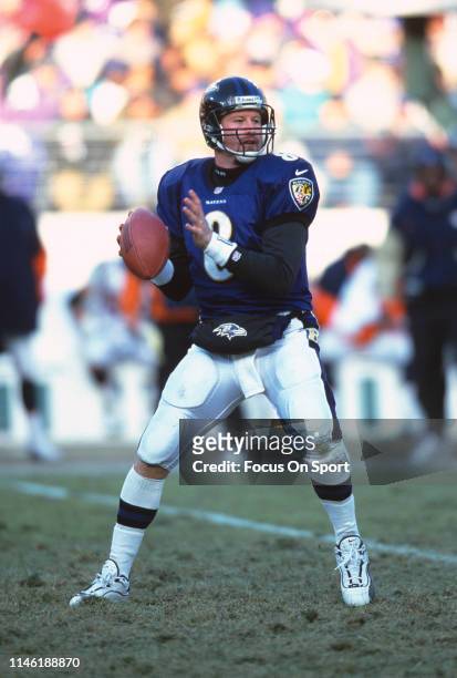 Trent Dilfer of the Baltimore Ravens looks to pass against the Denver Broncos during the AFC Wild Card Game December 31, 2000 at PSINet Stadium in...
