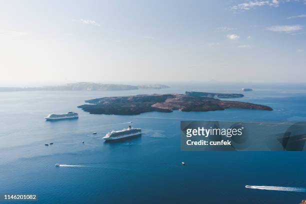 santorini island, view from fira towards nea kameni - ancient thira stock pictures, royalty-free photos & images