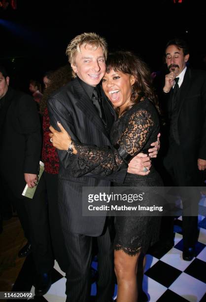 Barry Manilow and guest during 58th Annual Primetime Emmy Awards - Governors Ball at The Shrine Auditorium in Los Angeles, California, United States.
