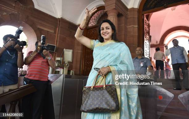 Candidate Hema Malini arrives to attend the NDA Parliamentary Party meeting, at Central Hall Parliament House, on May 25, 2019 in New Delhi, India....