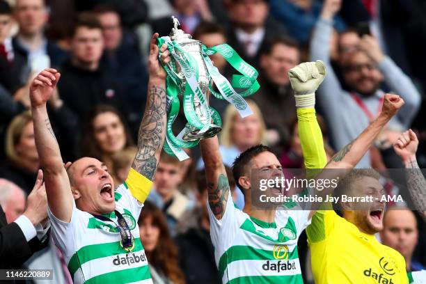 Scott Brown of Celtic and Mikael Lustig of Celtic celebrate with the William Hill Scottish Cup during the William Hill Scottish Cup final between...