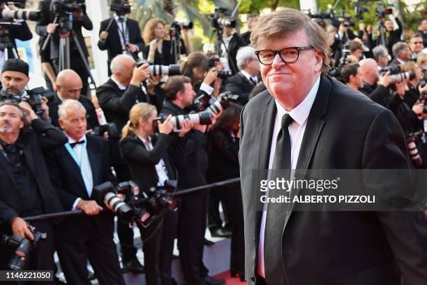 Director Michael Moore arrives for the screening of the film "The Specials " at the 72nd edition of the Cannes Film Festival in Cannes, southern...