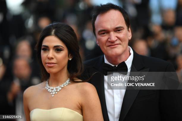 Film director Quentin Tarantino and his wife Israeli singer Daniella Pick pose as they arrive for the screening of the film "The Specials " at the...