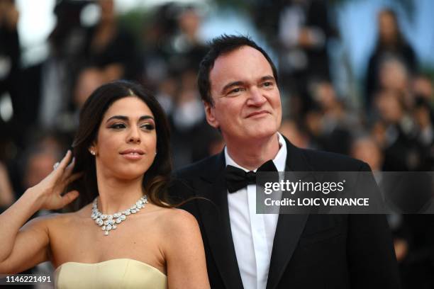 Film director Quentin Tarantino and his wife Israeli singer Daniella Pick pose as they arrive for the screening of the film "The Specials " at the...