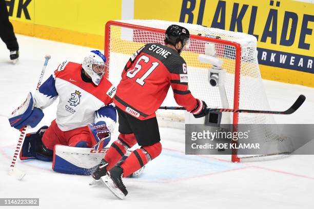 Canada's forward Mark Stone scores past Czech Republic's goalkeeper Patrik Bartosak during the IIHF Men's Ice Hockey World Championships semi-final...