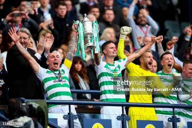 Scott Brown of Celtic and Mikael Lustig of Celtic celebrate with the William Hill Scottish Cup during the William Hill Scottish Cup final between...