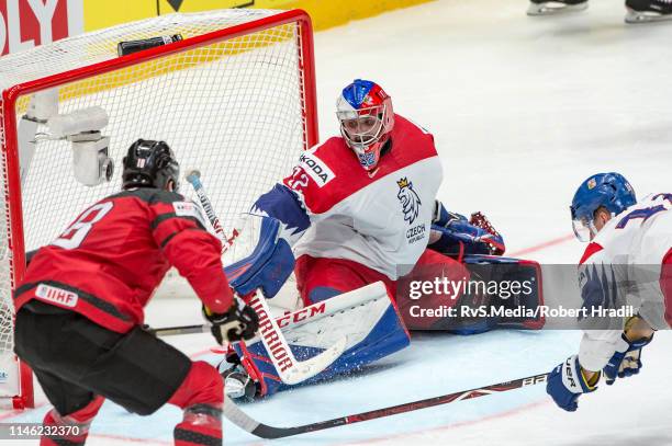 Pierre-Luc Dubois of Canada scores a goal against Goalie Patrik Bartosak of Czech Republic during the 2019 IIHF Ice Hockey World Championship...