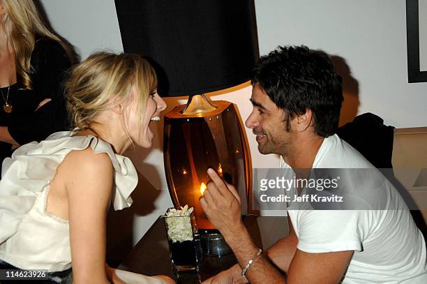 Kristen Bell and John Stamos during US Weekly's 2006 Hot Hollywood: Fresh 15 - Inside at Area in West Hollywood, California, United States.