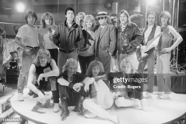 Channel 4 Christmas Show performers, group shot, UK, 12th December 1984; including Elton John, Def Leppard group members, Meat Loaf, Bonnie Tyler,...