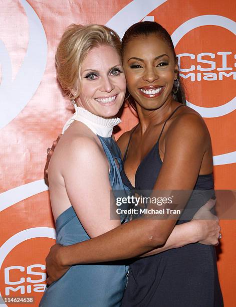 Emily Procter and Khandi Alexander during "CSI: Miami" 100th Episode Party - Arrivals at Malibu Beach in Malibu, California, United States.