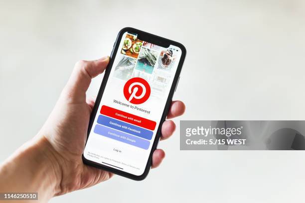 apple iphone xr showing homepage pinterest application on mobile - pinterest stock pictures, royalty-free photos & images