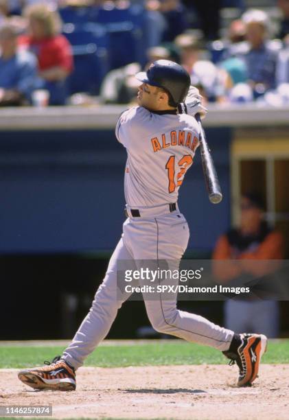 Roberto Alomar of the Baltimore Orioles at bats during a game agaisnt the Chicago White Sox circa 1997 at Comiskey Park in Chicago, Illinois. Roberto...