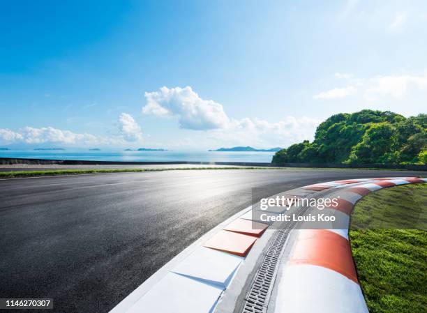 outdoor asphalt road - motor racing track stock pictures, royalty-free photos & images