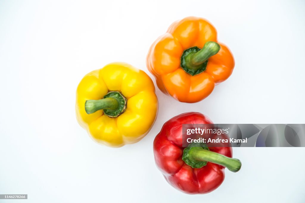 Fresh yellow, orange and red bell pepper
