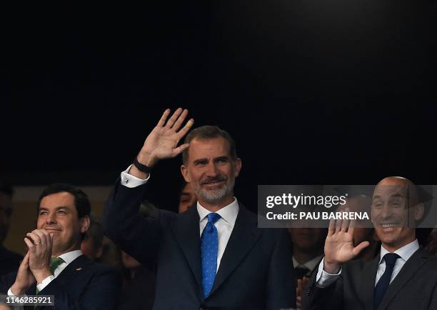 Spain´s King Felipe VI waves before the 2019 Spanish Copa del Rey final football match between Barcelona and Valencia at the Benito Villamarin...