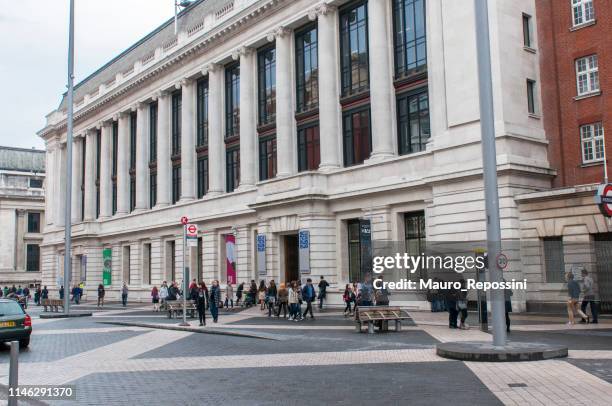 people walking at the entrance of the science museum on exhibition road in south kensington area, london, england, uk. - science museum stock pictures, royalty-free photos & images