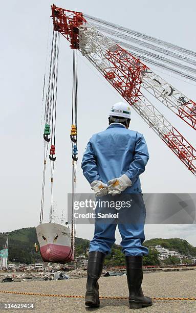 Tuna fishing ship is salvaged to be returned to the sea on May 23, 2011 in Kesennuma, Miyagi, Japan. According to the National Police Agency, the...