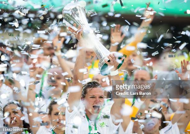 Alexandra Popp of Wolfsburg celebrates with the trophy after winning the Women's DFB Cup final match between VfL Wolfsburg and SC Freiburg at...