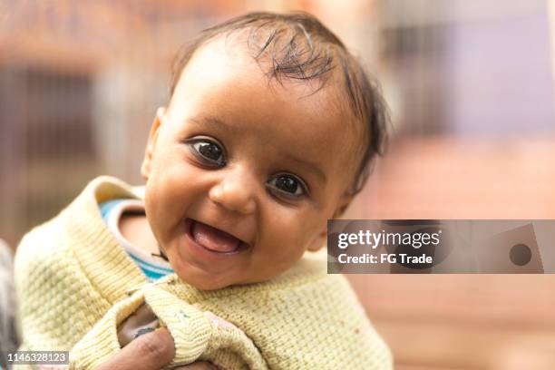 cute little baby girl - refugee babies stock pictures, royalty-free photos & images