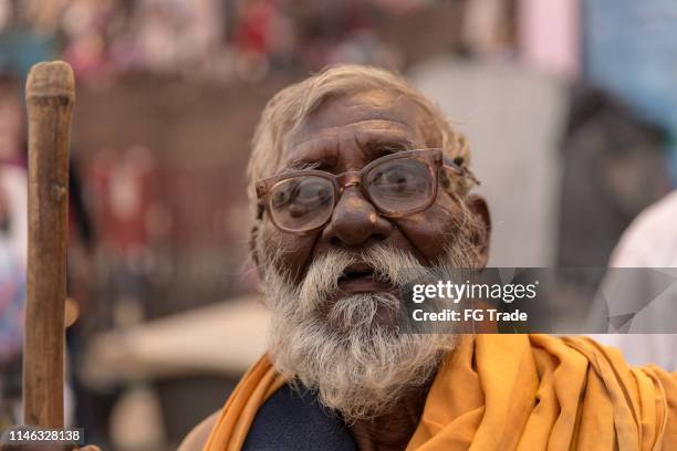 senior indian man portrait - sadhu stock pictures, royalty-free photos & images
