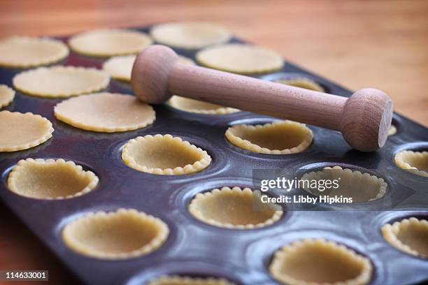 mini muffin pan pastry tart shells - muffin tin stock pictures, royalty-free photos & images