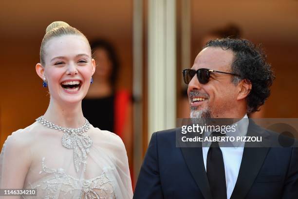 Actress and member of the jury of the Cannes Film Festival Elle Fanning and Mexican director and President of the Jury of the Cannes Film Festival...
