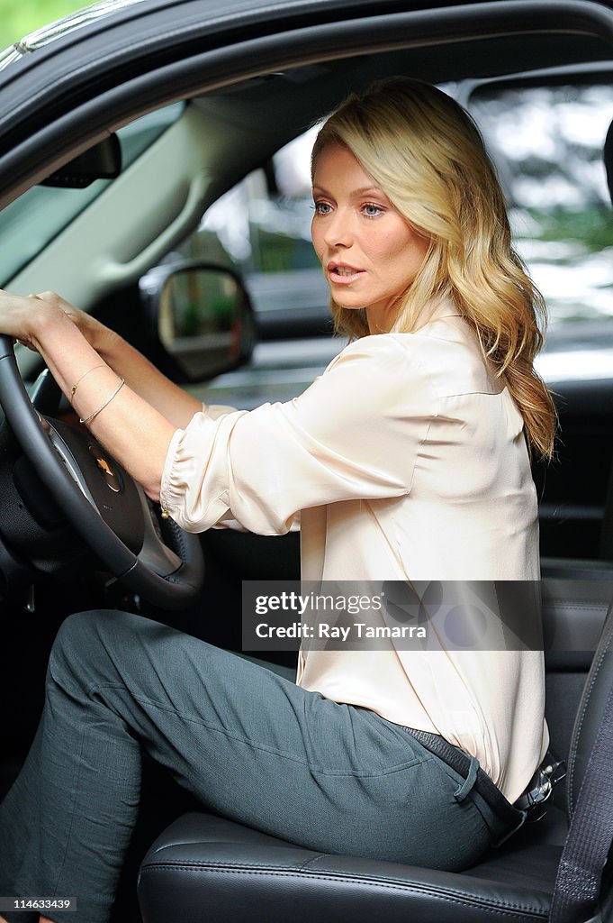 Kelly Ripa 2011 TV host Kelly Ripa films a car giveaway segment on the