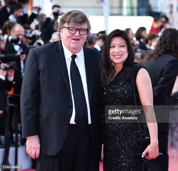 Director Michael Moore and Sonia Low arrive for the Closing Awards Ceremony of the 72nd annual Cannes Film Festival in Cannes, France on May 25, 2019.