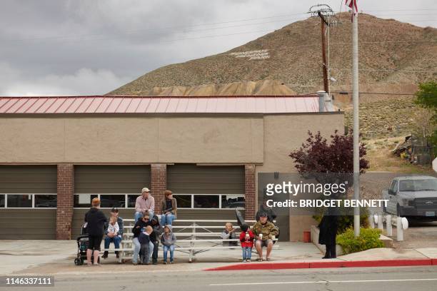 Onlookers gather waiting for the parade to pass them during Jim Butler Days, founder of Tonopah where they celebrate the roots mining has in the...
