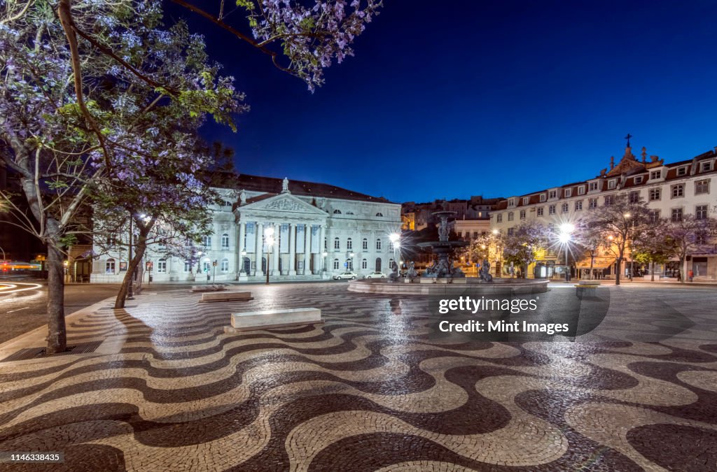 Rossio Square illuminated at night, Lisbon, Portugal