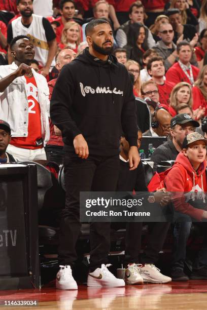 Rapper Drake stares on during the game between the Milwaukee Bucks and the Toronto Raptors during Game Six of the Eastern Conference Finals on May...