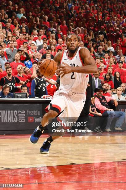 Kawhi Leonard of the Toronto Raptors drives through the paint during the game against the Milwaukee Bucks during Game Six of the Eastern Conference...