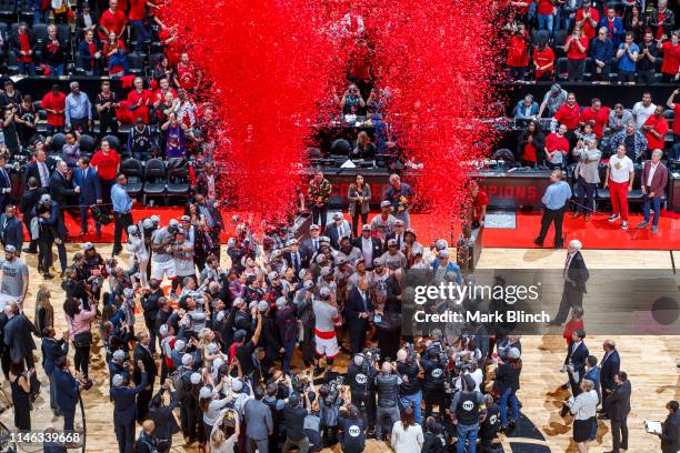 The Toronto Raptors receive the Eastern Conference Finals Trophy after Game Six of the Eastern Conference Finals against the Milwaukee Bucks on May...