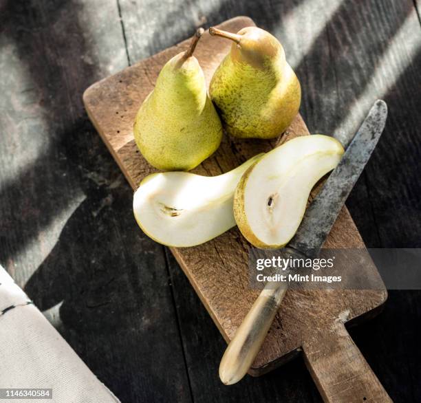 close up of fresh sliced pears - pears stock-fotos und bilder