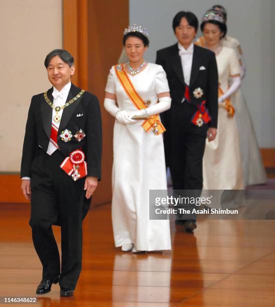 New Emperor Naruhito, Empress Masako, Crown Prince Akishino and Crown Princess Kiko of Akishino enter the Matsu-no-Ma hall to attend the...