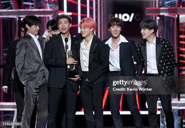 Hope, Jimin, Jin, RM, and V of BTS accept the Top Duo/Group award onstage during the 2019 Billboard Music Awards at MGM Grand Garden Arena on May 01,...