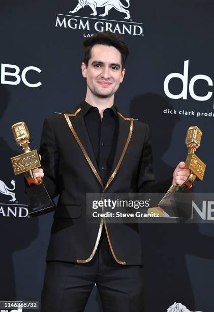 Brendon Urie of Panic! at the Disco poses with the award for Top Rock Song for "High Hopes" in the press room during the 2019 Billboard Music Awards...