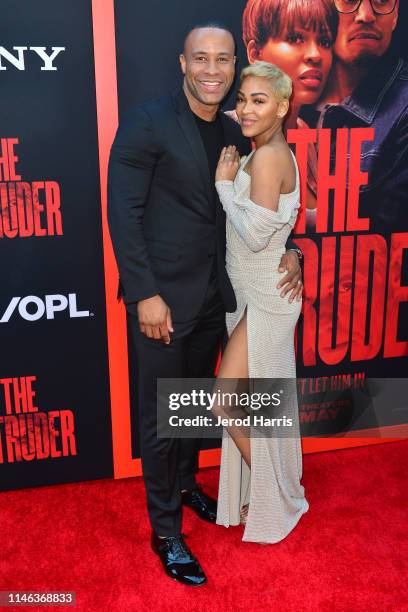 DeVon Franklin and Meagan Good arrive at the Premiere of 'The Intruder' at ArcLight Hollywood on May 01, 2019 in Hollywood, California.