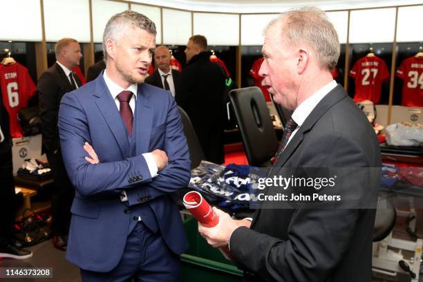 Ole Gunnar Solskjaer of Manchester United '99 Legends chats to Manchester United '99 Legends Assistant Manager Steve McClaren in the dressing room...