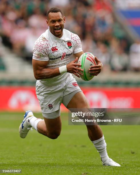 Dan Norton of England runs in to score a try during the HSBC London Sevens England v Spain 13th place semi-final match at Twickenham Stadium on May...