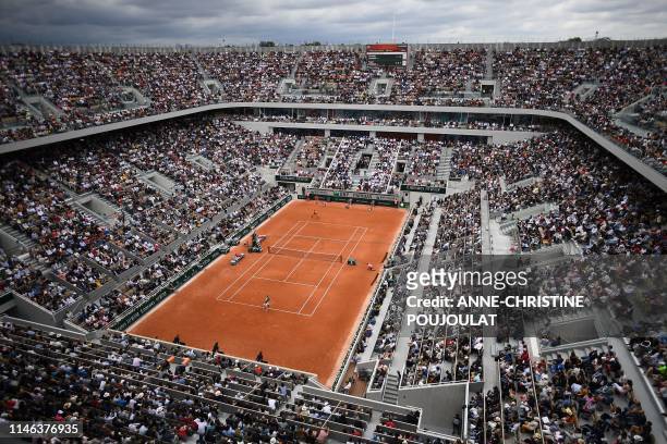 General view of the Philippe Chatrier court during the men's singles first round match between Switzerland's Roger Federer and Italy's Lorenzo...