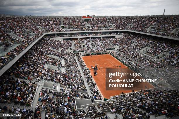 General view of the Philippe Chatrier court with the Eiffel Tower in the background during the men's singles first round match between Switzerland's...