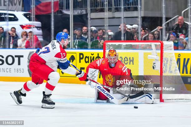 Andrei Vasilevski of Russia stops shot from Filip Hronek of Czech Republic during the 2019 IIHF Ice Hockey World Championship Slovakia third place...