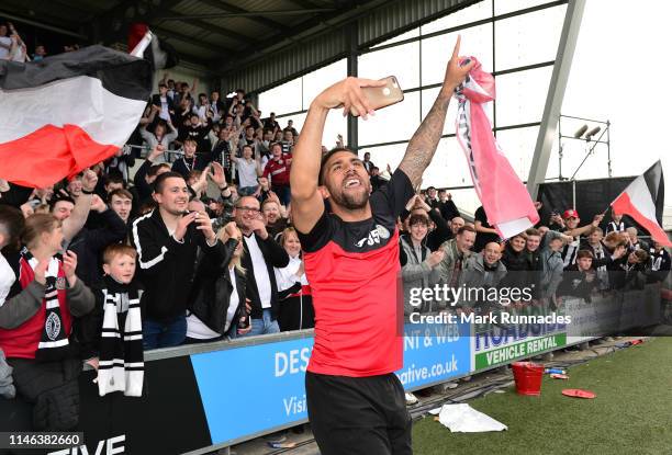 Anton Ferdinand of St Mirren celebrates with the fans as St Mirren win the play-off final by beating Dundee United after extra time and penalties...