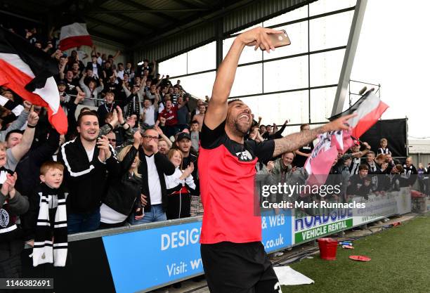 Anton Ferdinand of St Mirren celebrates with the fans as St Mirren win the play-off final by beating Dundee United after extra time and penalties...