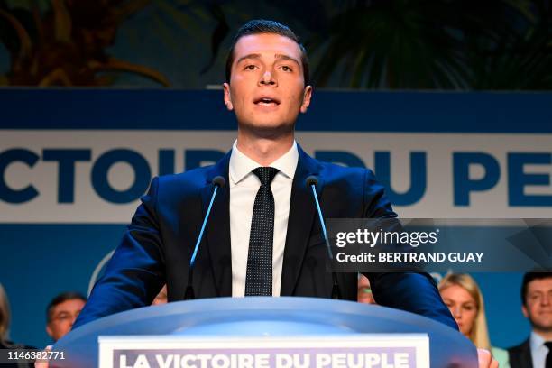 Head candidate of the French far-right Rassemblement National list Jordan Bardella delivers a speech after the announcement of initial results during...