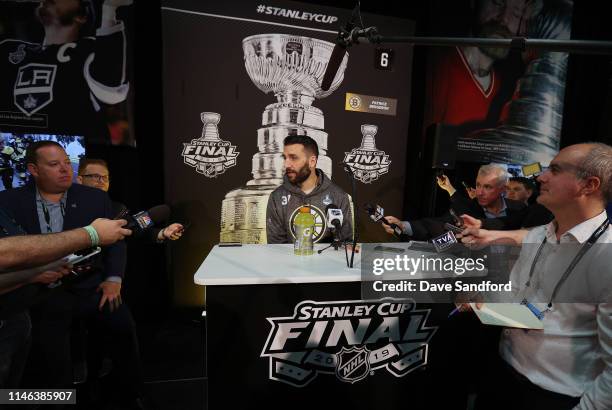 Patrice Bergeron of the Boston Bruins speaks during media day ahead of the 2019 Stanley Cup Final at TD Garden on May 26, 2019 in Boston,...