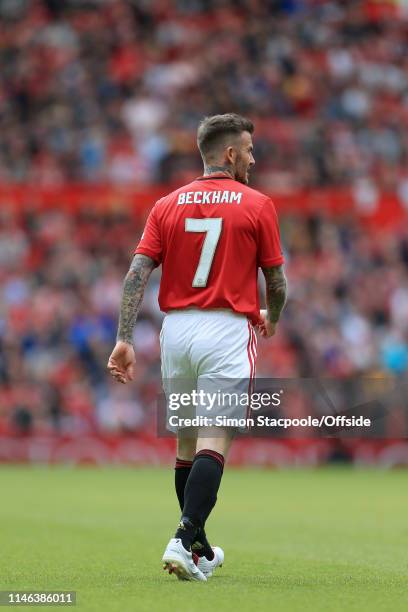 David Beckham of Man Utd looks on during the Treble Reunion friendly match between the Manchester United '99 Legends and FC Bayern Legends at Old...