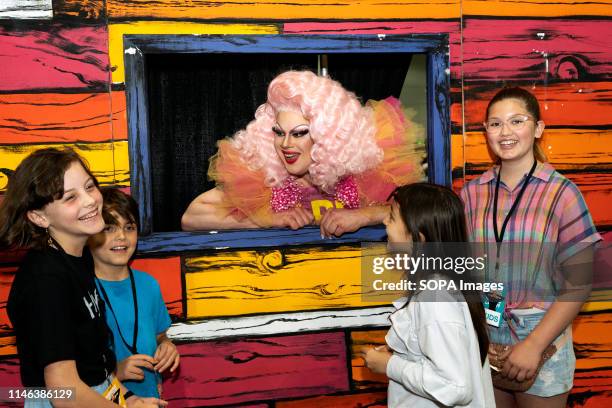 Drag queen Nina West of RuPauls Drag Race season 11 speaking with young fans during RuPaul's DragCon LA 2019 at the Los Angeles Convention Center in...